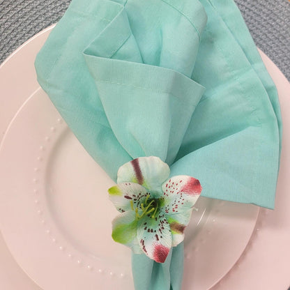 Maison Charlô | Wholesale Set of 20 Turquoise Small Astromelia Napkin Rings for event, restaurant, market